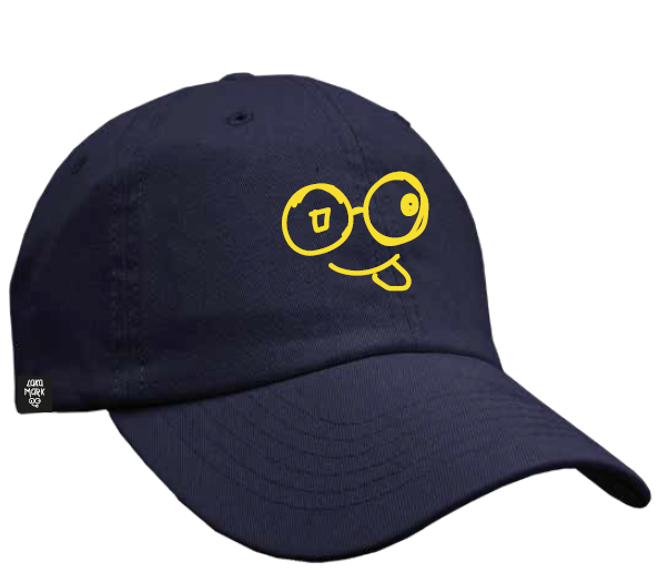 Angled front view of navy dad hat with yellow glasses-face logo and curved brim against a white background