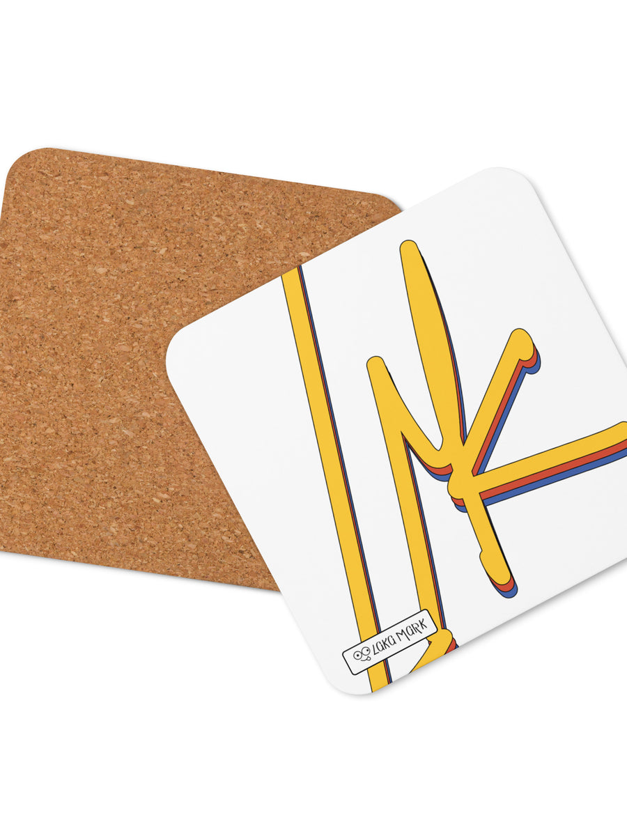 White square coaster with bold yellow graphic artwork and red and blue outlines, shown with brown backing