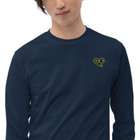Close-up of a navy crew neck t-shirt showing the yellow tongue-out glasses-face chest design