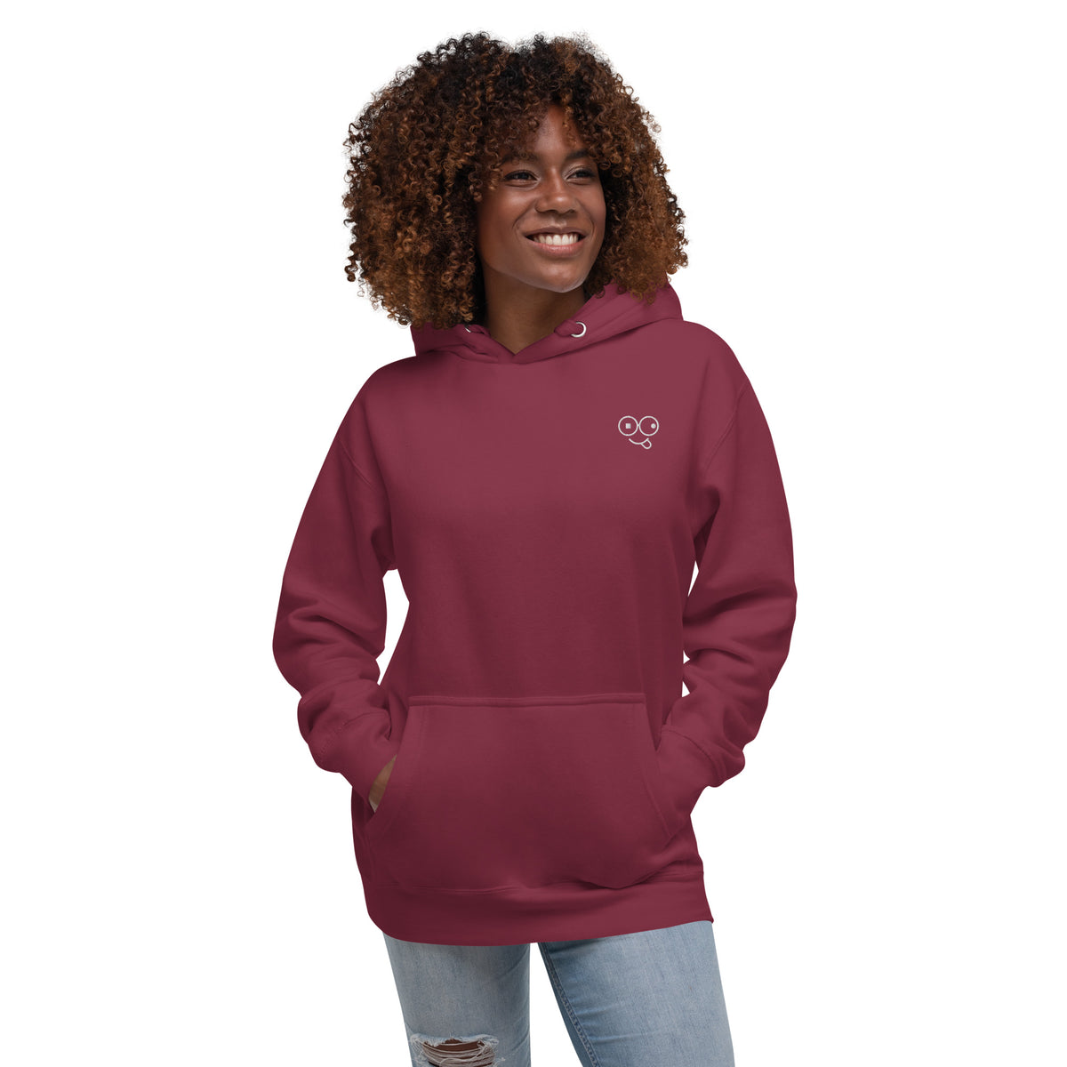 Model wearing a maroon pullover hoodie with a white glasses-face design and front pouch pocket