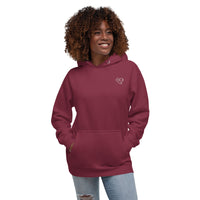 Model wearing a maroon pullover hoodie with a white glasses-face design and front pouch pocket